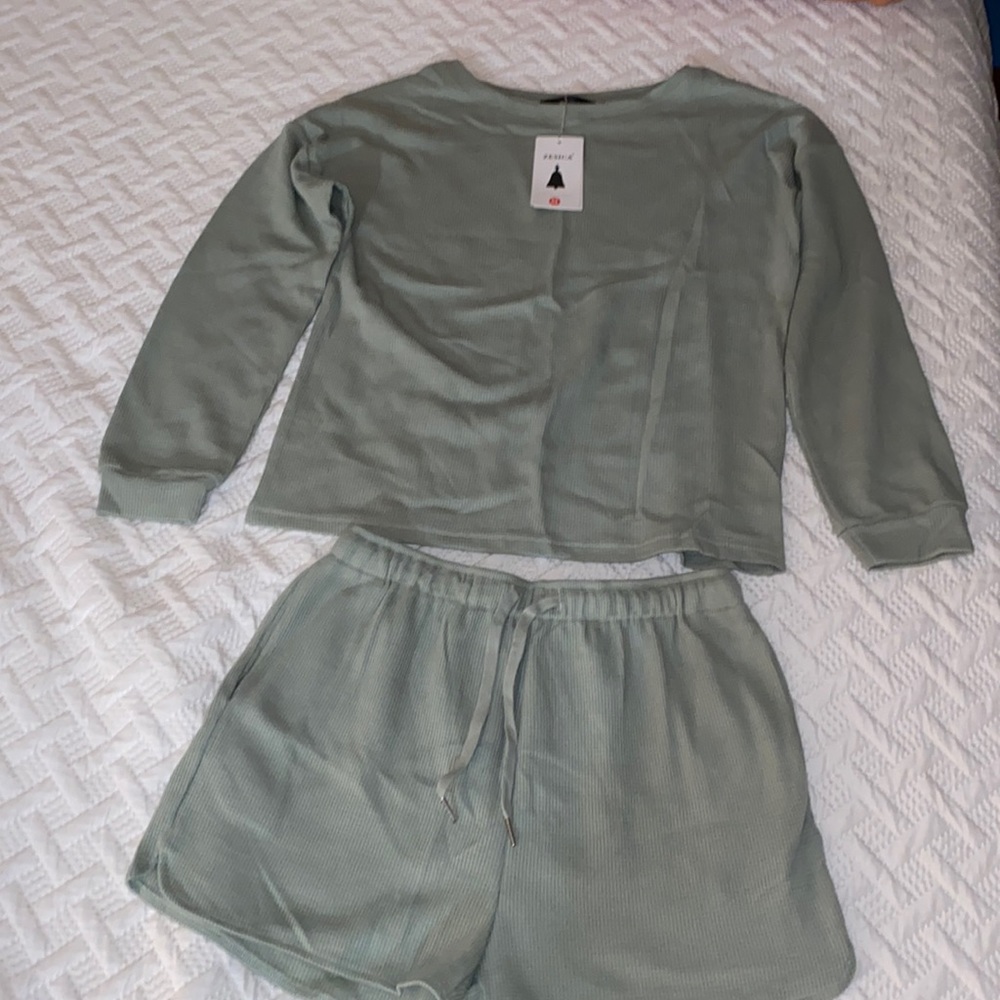 Two piece lounge set. Long sleeve shirt & shorts.